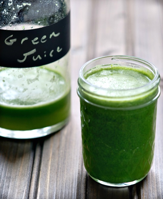 Healthy Green Juice on a wooden table.
