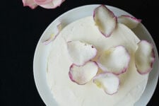 cropped image of the raspberry rose cake top with rose petals