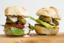 cropped image of two felafel burgers