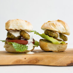 cropped image of two felafel burgers