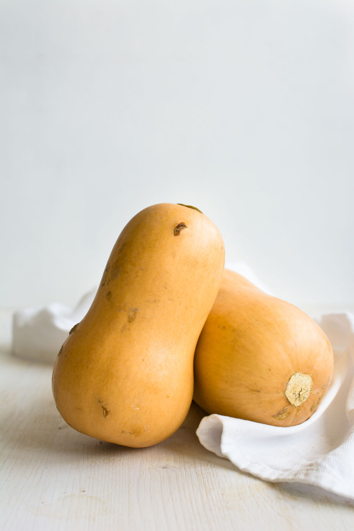 close up image of 2 butternut squash