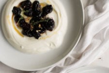 Sweet Roasted Grapes draped over thick Greek yoghurt make an easy, healthy breakfast recipe that will give you the best start to your day. Click through for the recipe!
