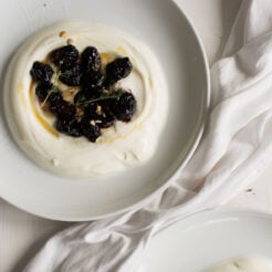 roasted grapes on top of yogurt with honey and thyme
