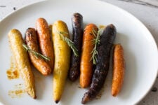 Complete your Roast dinner with these perfectly Honey Roasted Carrots with Rosemary. Crispy, soft and sweet, these carrots will compete with the main event at your next dinner!