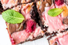 Thick, fudgy chocolate brownies, swirled with fresh raspberry cheesecake are an easy, delicious recipe that is so addictive, you won't be able to have just one!