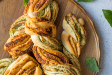 These delicious and easy two tone pesto bread twists will make any meal more interesting! Perfect for dipping in soup! Watch our video tutorial to see just how ridiculously easy it is to make these!