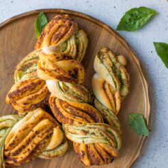 These delicious and easy two tone pesto bread twists will make any meal more interesting! Perfect for dipping in soup! Watch our video tutorial to see just how ridiculously easy it is to make these!