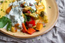 Polenta is a delicious, creamy base for a great vegetarian meal. Pair it with seasoned roasted vegetables and this zingy, herby dressing for a great meal!
