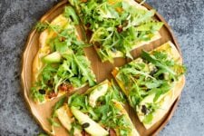 15 Minute Hummus Salad Pizza. This pizza is your new lunchbox best friend. It's absolutely perfect for a quick lunch on the go!