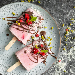 Dairy Free Raspberry Coconut Smoothie Popsicles, perfect for making with kids during the summer! These wholesome, healthy popsicles feel like such a treat, with no refined sugar or dairy!