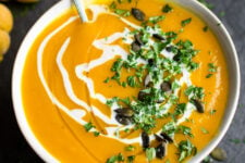 Pumpkin Sage Soup. A vibrant bowl of Autumnal colour and flavour. Make the most of pumpkin season with this herby bowl of sunshine!