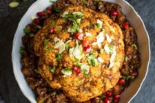 Whole Spiced Roasted Cauliflower with Spicy Lentils, a great vegan main dish!