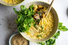 A rich, vegan, coconut curry ramen bowl, with marinated mushrooms and crispy tofu!