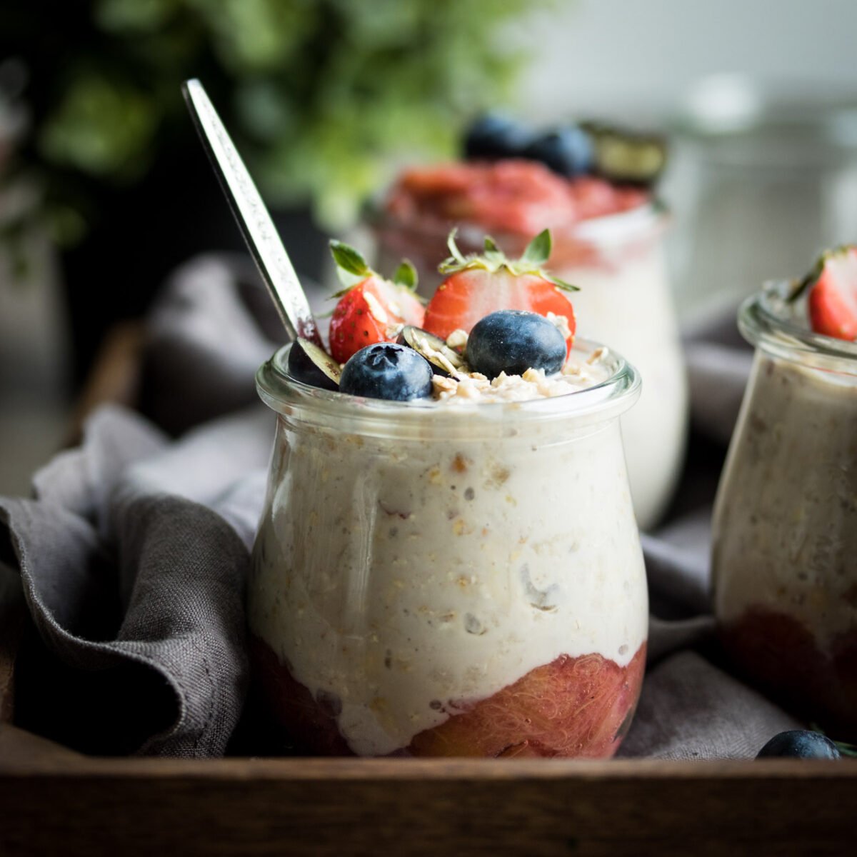 Vegan overnight oats with a sweet rhubarb compote - the perfect healthy, on the go breakfast!