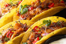Mexican tacos stuffed with glazed chicken