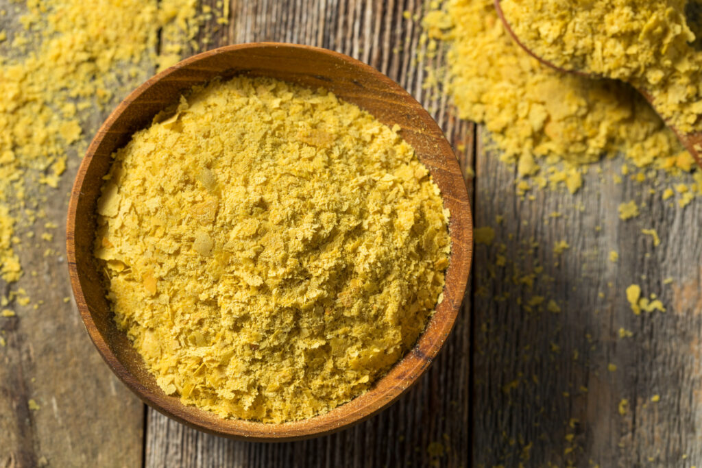 Raw Yellow Organic Nutritional Yeast in a Bowl.