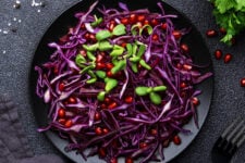 Salad with red cabbage and pomegranate seeds.