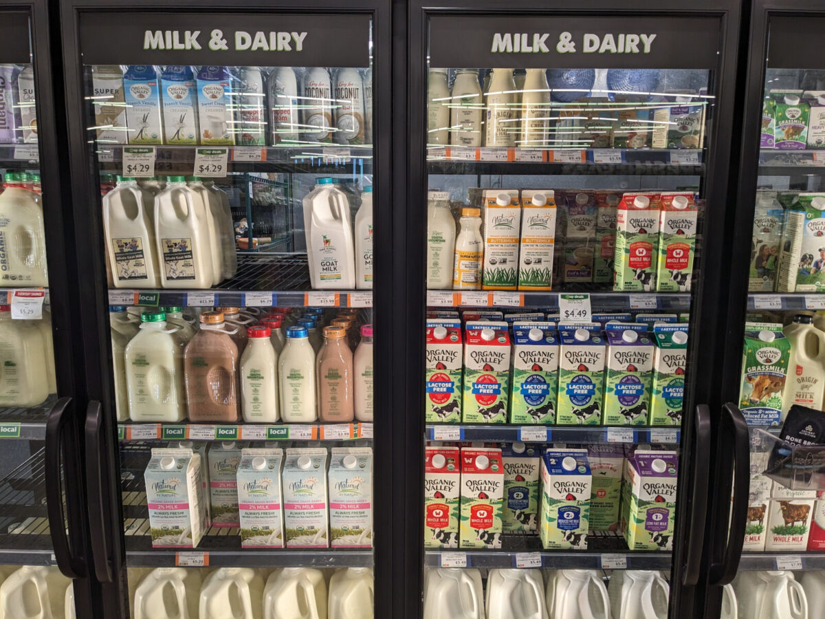 The milk and dairy section at a grocery store.